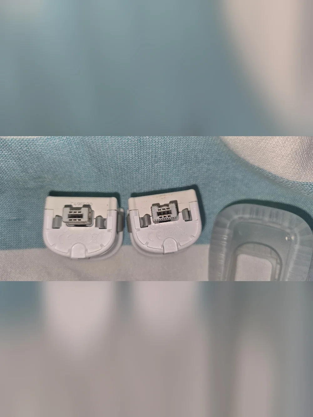2 Pack of Genuine Nintendo Wii Motion Plus Adapter and Silicon Cases